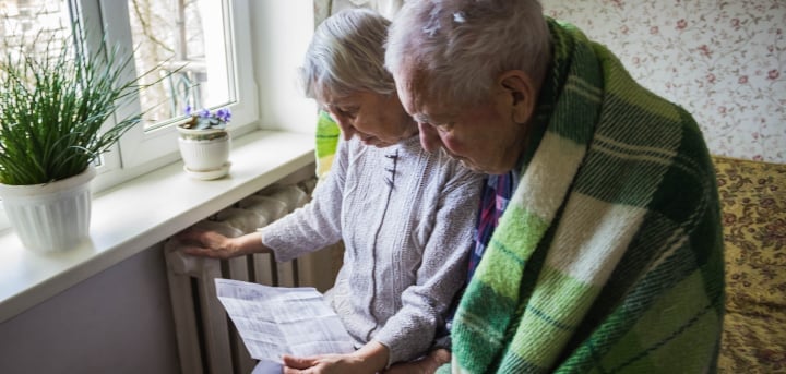 Pensioners keeping warm at home