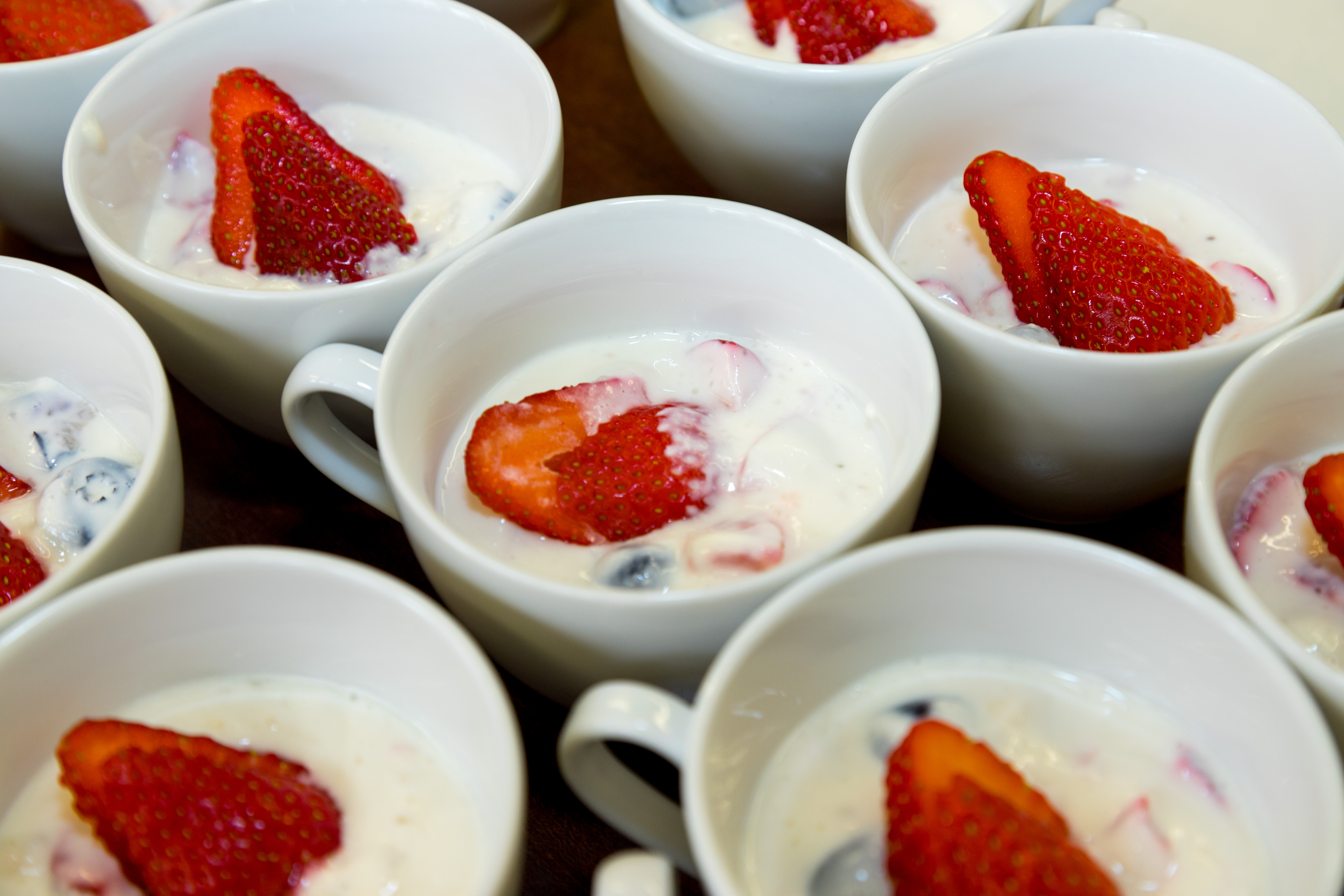 Strawberries in tea cups
