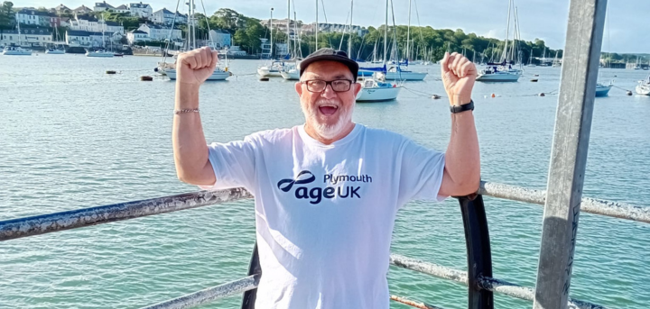 Fundraiser Dave Coots celebrates finishing his 50 mile challenge.