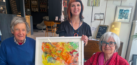 Artist Judy White pictured with husband Martin and, centre, arts tutor Caris Jackson