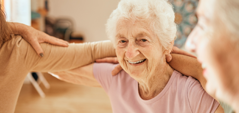 Older women dancing together