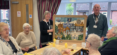 Newport day centre volunteers and members with the tile mural