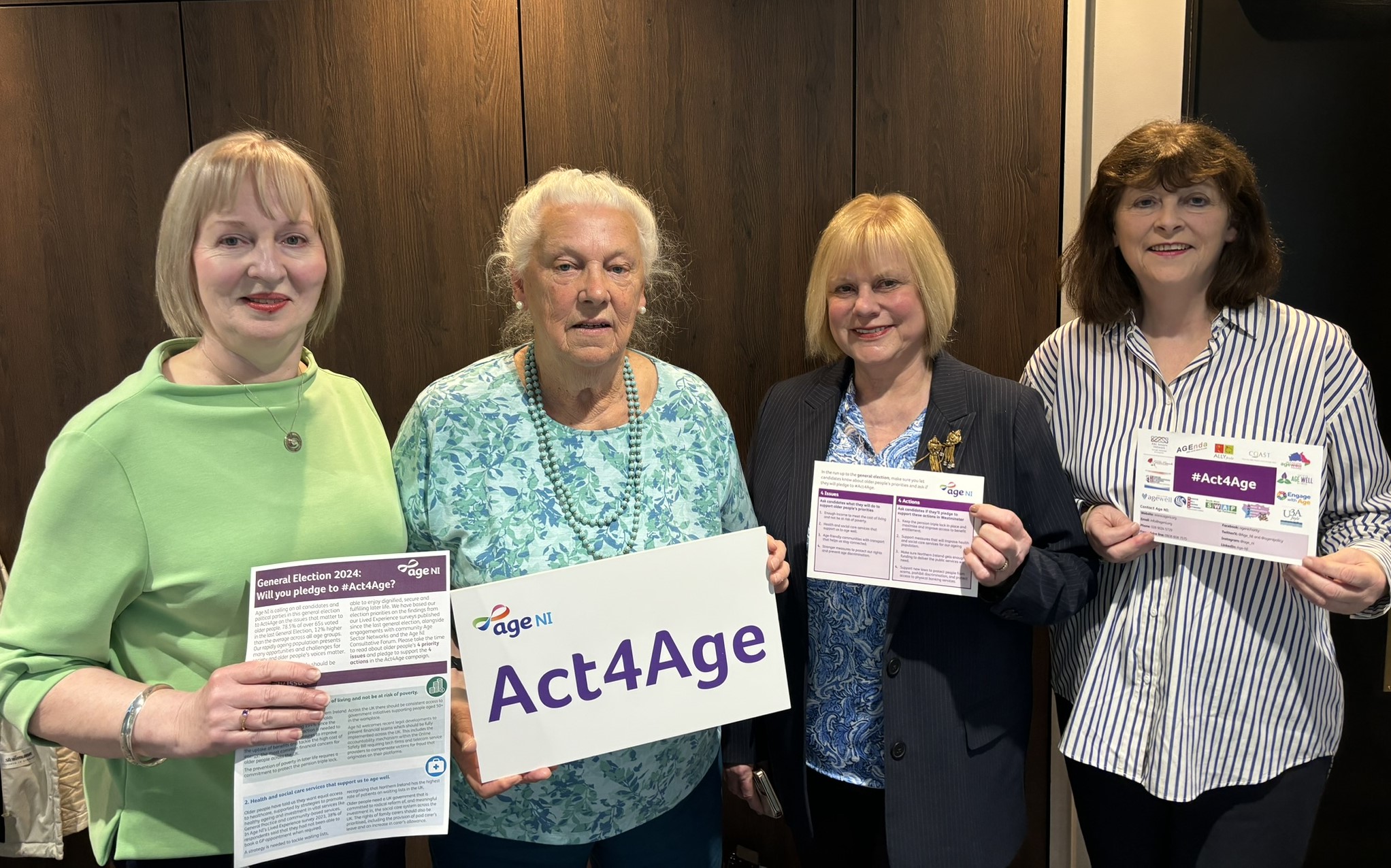Wilma Stewart, Co Vice-Chair, Age NI’s Consultative Forum; Ann Murray, Chair, Age NI’s Consultative Forum; Anne Murray, Co Vice-Chair, Age NI’s Consultative Forum; Paschal McKeown, Charity Director Age NI holding Act4Age placard