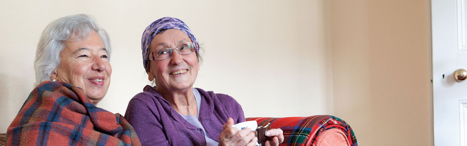 Two older ladies sat together