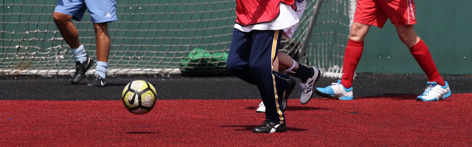 A group of men playing walking football