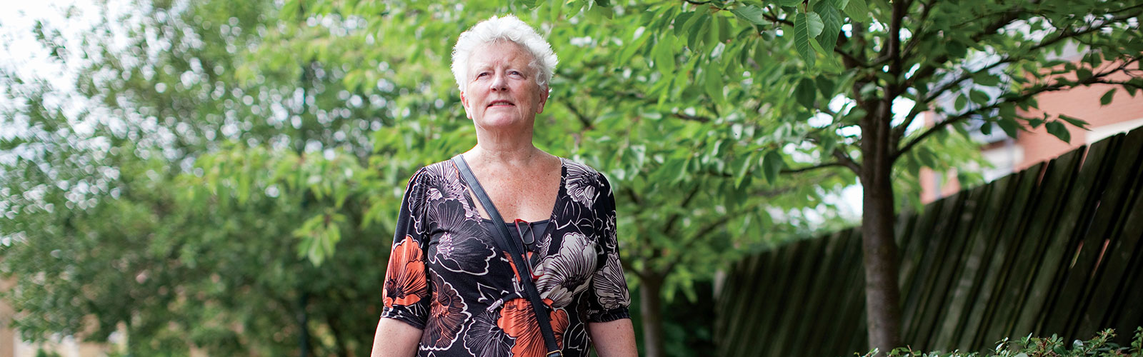 A woman holding two carrier bags