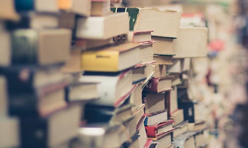 Hundreds of books stacked on shelves