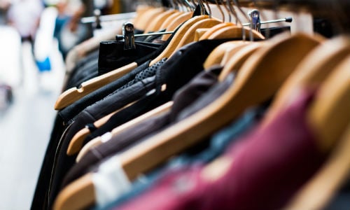 A rail of clothes on hangers