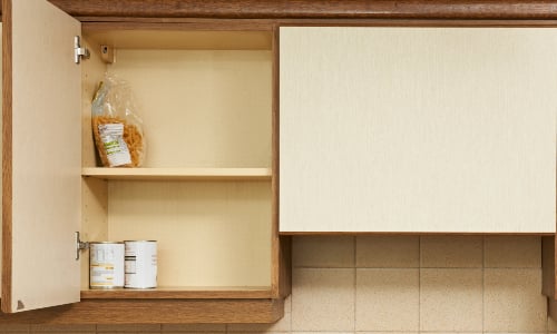 Open cupboards almost bare