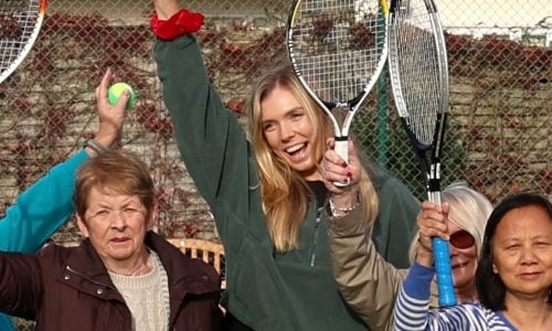 Katie Boulter with older service users at a walking tennis session